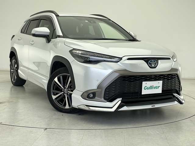 トヨタ カローラ クロス ハイブリッド Z 千葉県 2022(令4)年 2.1万km プラチナホワイトパールマイカ モデリスタエアロ　/ディスプレイオーディオ　/全方位モニター/フルセグＴＶ　/Ｂｌｕｅｔｏｏｔｈ　Ｍｉｒａｃａｓｔ　ＵＳＢ　/ハーフレザーシート　/Ｄ席パワーシート　/前席シートヒーター　/パワーバックドア　/衝突被害軽減ブレーキ　/ＢＳＭ/前後コーナーセンサー/追従クルーズコントロール/レーンキープアシスト/ステアリングヒーター/LEDヘッドライト/純正フロアマット/スマートキー