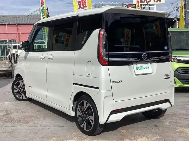 日産 ルークス ハイウェイスター Gターボ 京都府 2021(令3)年 1.4万km ホワイトパール  ワンオーナー/ エマージェンシーブレーキ/ 両側パワースライドドア/ 革調シートカバー/ プラズマクラスターリアファン/ シートバックテーブル×2/ リアロールサンシェイド/ USBソケット/ 純正9インチナビ　フルセグ/ アラウンドビューモニター/ CD DVD再生/ BTオーディオ/ SD REC/ ドライブレコーダー/ インテリキーレス　スペアあり/ エンジンプッシュスタート/ 保証書　取説　/ 登録時走行距離　13347キロ