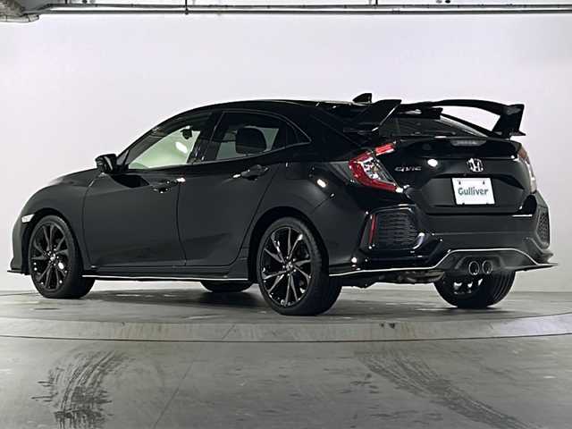 ホンダ シビック ハッチバック 広島県 2018(平30)年 5万km クリスタルブラックパール Honda SENSING/・衝突軽減ブレーキ〈CMBS〉/・渋滞追従機能付アダプティブ・クルーズ・コントロール/・LKAS〈車線維持支援システム〉/・路外逸脱抑制機能/・オートハイビーム/・標識認識機能/アジャイルハンドリングアシスト/純正ナビ（VXM-195VFi）/・フルセグ/CD/DVD/Bluetooth/SD/バックカメラ/革巻きステアリング/ステアリングスイッチ/パドルシフト/オートライト/シートヒーター/電動パーキングブレーキ/ブレーキホールド/スマートキー/プッシュスタート/ユピテルドライブレコーダー/ETC/ピアノブラック・フロントグリル/フロントスポイラー/純正１８インチアルミホイール/W+サイド+カーテンエアバック