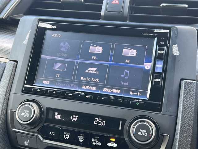 ホンダ シビック ハッチバック 広島県 2018(平30)年 5万km クリスタルブラックパール Honda SENSING/・衝突軽減ブレーキ〈CMBS〉/・渋滞追従機能付アダプティブ・クルーズ・コントロール/・LKAS〈車線維持支援システム〉/・路外逸脱抑制機能/・オートハイビーム/・標識認識機能/アジャイルハンドリングアシスト/純正ナビ（VXM-195VFi）/・フルセグ/CD/DVD/Bluetooth/SD/バックカメラ/革巻きステアリング/ステアリングスイッチ/パドルシフト/オートライト/シートヒーター/電動パーキングブレーキ/ブレーキホールド/スマートキー/プッシュスタート/ユピテルドライブレコーダー/ETC/ピアノブラック・フロントグリル/フロントスポイラー/純正１８インチアルミホイール/W+サイド+カーテンエアバック