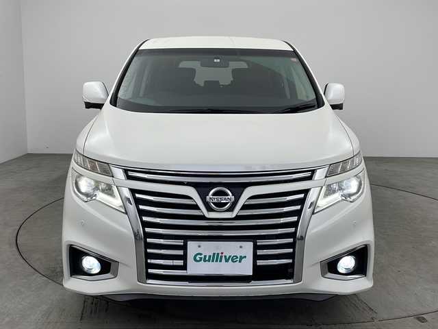 日産 エルグランド 350ハイウェイスター 兵庫県 2014(平26)年 6.9万km ブリリアントホワイトパール ・純正ナビ/AM/FM/CD/DVD/Bluetooth/TV/・フリップダウンモニター/・全周囲カメラ/・ビルトインETC/・クルーズコントロール/・衝突軽減ブレーキ/・横滑り防止装置/・盗難防止装置/・パワーバックドア/・両側パワースライド/・コーナーセンサー/・ハーフレザーシート/・オットマン/・電動リアゲート/・LEDヘッドライト/・オートライト/・ダブルオートエアコン/・プッシュスタートボタン/・スマートキー/・ステアリングリモコン/・純正18インチアルミホイール/・USBジャック/・純正フロアマット
