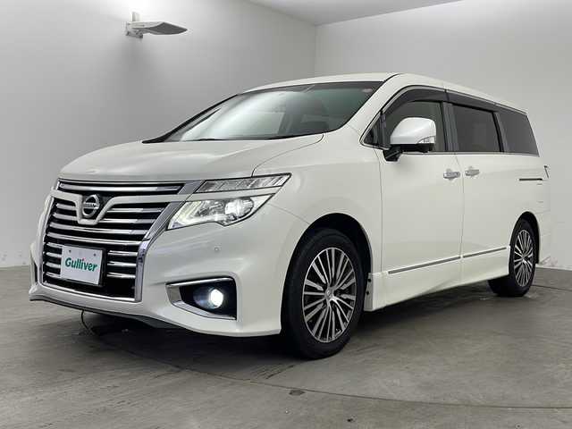日産 エルグランド 350ハイウェイスター 兵庫県 2014(平26)年 6.9万km ブリリアントホワイトパール ・純正ナビ/AM/FM/CD/DVD/Bluetooth/TV/・フリップダウンモニター/・全周囲カメラ/・ビルトインETC/・クルーズコントロール/・衝突軽減ブレーキ/・横滑り防止装置/・盗難防止装置/・パワーバックドア/・両側パワースライド/・コーナーセンサー/・ハーフレザーシート/・オットマン/・電動リアゲート/・LEDヘッドライト/・オートライト/・ダブルオートエアコン/・プッシュスタートボタン/・スマートキー/・ステアリングリモコン/・純正18インチアルミホイール/・USBジャック/・純正フロアマット