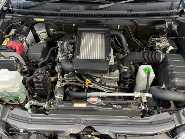 スズキ ジムニー クロスアドベンチャー 新潟県 2012(平24)年 8.1万km クエーサーグレーメタリック ４WD/ターボ/リモコンキー/メモリナビ　型式AVN-G02/CD/DVD/フルセグ/レザーシート/フォグ/スタッドレスタイヤ4本積載