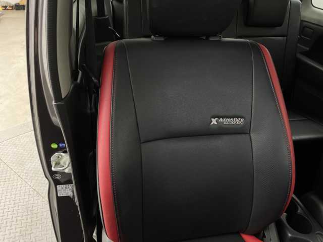 スズキ ジムニー クロスアドベンチャー 新潟県 2012(平24)年 8.1万km クエーサーグレーメタリック ４WD/ターボ/リモコンキー/メモリナビ　型式AVN-G02/CD/DVD/フルセグ/レザーシート/フォグ/スタッドレスタイヤ4本積載
