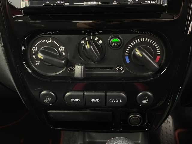 スズキ ジムニー クロスアドベンチャー 新潟県 2012(平24)年 8.1万km クエーサーグレーメタリック ４WD/ターボ/リモコンキー/メモリナビ　型式AVN-G02/CD/DVD/フルセグ/レザーシート/フォグ/スタッドレスタイヤ4本積載