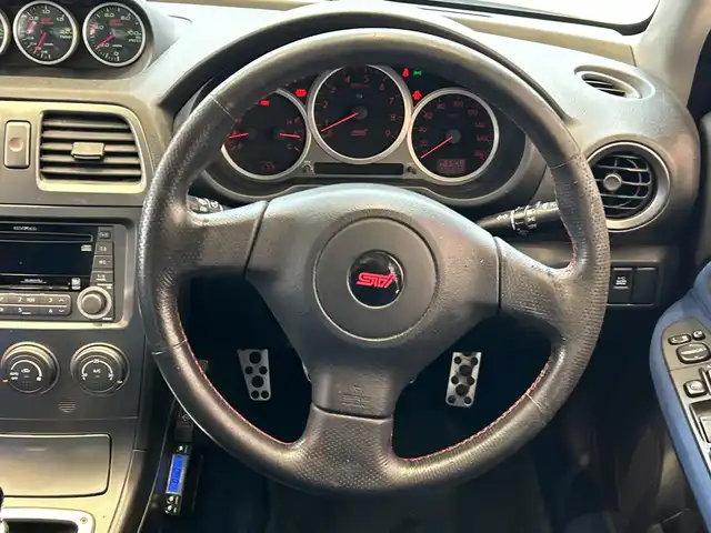 スバル インプレッサ ＷＲＸ STi 埼玉県 2004(平16)年 10.7万km パール 純正エアロ　/ＭＤ再生／ＣＤ再生　/純正１７インチアルミホイール　/純正フロアマット　/ハロゲンライト　/リモコンキー　/保証書/取扱説明書/禁煙車