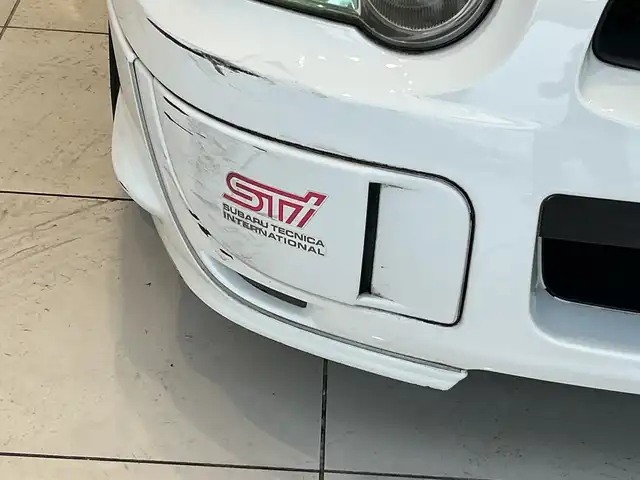 スバル インプレッサ ＷＲＸ STi 埼玉県 2004(平16)年 10.7万km パール 純正エアロ　/ＭＤ再生／ＣＤ再生　/純正１７インチアルミホイール　/純正フロアマット　/ハロゲンライト　/リモコンキー　/保証書/取扱説明書/禁煙車