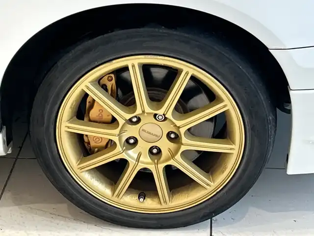 スバル インプレッサ ＷＲＸ STi 埼玉県 2004(平16)年 10.7万km パール 純正エアロ　/ＭＤ再生／ＣＤ再生　/純正１７インチアルミホイール　/純正フロアマット　/ハロゲンライト　/リモコンキー　/保証書/取扱説明書/禁煙車