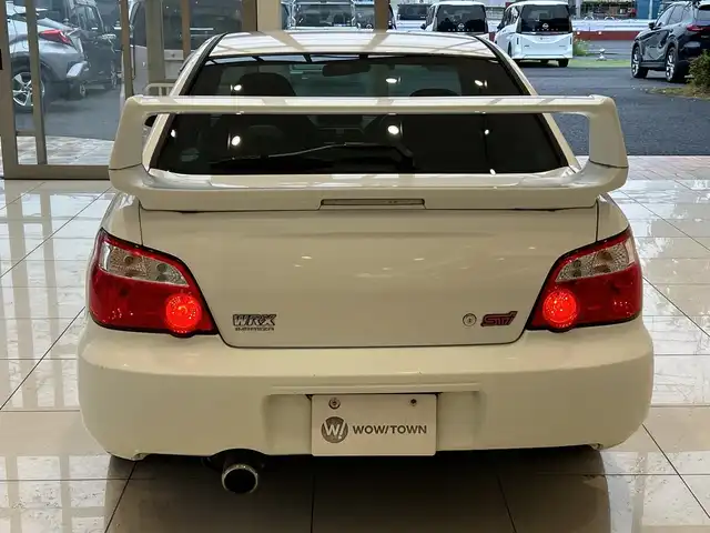 スバル インプレッサ ＷＲＸ STi 埼玉県 2004(平16)年 10.7万km パール 純正エアロ　/ＭＤ再生／ＣＤ再生　/純正１７インチアルミホイール　/純正フロアマット　/ハロゲンライト　/リモコンキー　/保証書/取扱説明書/禁煙車