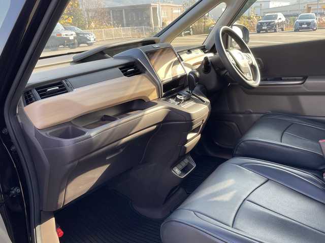 ホンダ フリード G ホンダセンシング 愛媛県 2019(令1)年 3万km プレミアムスパークルブラックパール 純正９インチナビ/Bluetooth/CD/DVD/フルセグ/SD/ホンダセンシング/ドライブレコーダー前後/クルーズコントロール追従あり/ビルトインETC/両側パワースライドドア/レザーシートカバー/サンシェード/純正フロアマット/オートLEDヘッドライト/スマートキー/スペアキー/保証書/取扱説明書/メンテナンスノート