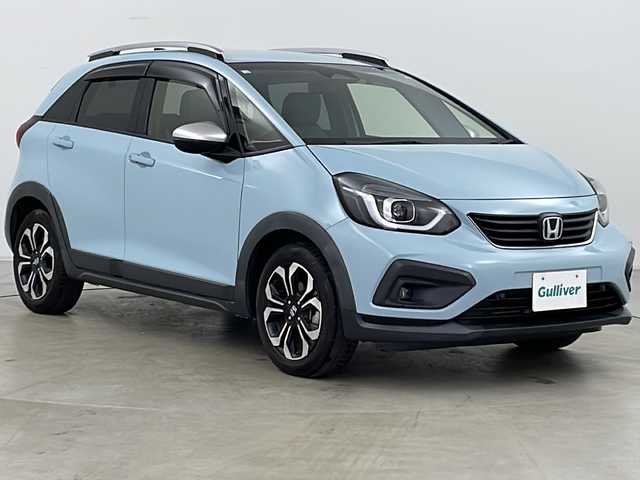 ホンダ フィット e:HEVクロスター 道央・札幌 2020(令2)年 6.3万km サーフブルー ・4WD/・寒冷地仕様/・純正ナビ&BT&TV&CD&DVD/・バックカメラ/・Honda　SENSING/・衝突軽減ブレーキ/・誤発進抑制機能/・路外逸脱抑制機能/・ACC/・車線維持支援システム/・先行車発進お知らせ/・標識認識機能/・オートハイビーム/・前後コーナーセンサー/・ルーフレール/・ステアリングスイッチ/・ドアミラーヒーター/・LEDヘッドライト/・フォグランプ/・オートライト/・スマートキー/・ETC/・純正16インチAW