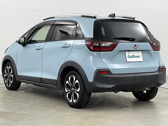 ホンダ フィット e:HEVクロスター 道央・札幌 2020(令2)年 6.3万km サーフブルー ・4WD/・寒冷地仕様/・純正ナビ&BT&TV&CD&DVD/・バックカメラ/・Honda　SENSING/・衝突軽減ブレーキ/・誤発進抑制機能/・路外逸脱抑制機能/・ACC/・車線維持支援システム/・先行車発進お知らせ/・標識認識機能/・オートハイビーム/・前後コーナーセンサー/・ルーフレール/・ステアリングスイッチ/・ドアミラーヒーター/・LEDヘッドライト/・フォグランプ/・オートライト/・スマートキー/・ETC/・純正16インチAW