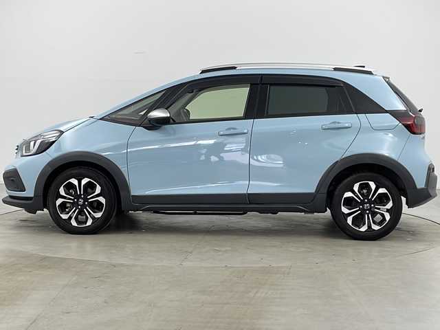 ホンダ フィット e:HEVクロスター 道央・札幌 2020(令2)年 6.3万km サーフブルー ・4WD/・寒冷地仕様/・純正ナビ&BT&TV&CD&DVD/・バックカメラ/・Honda　SENSING/・衝突軽減ブレーキ/・誤発進抑制機能/・路外逸脱抑制機能/・ACC/・車線維持支援システム/・先行車発進お知らせ/・標識認識機能/・オートハイビーム/・前後コーナーセンサー/・ルーフレール/・ステアリングスイッチ/・ドアミラーヒーター/・LEDヘッドライト/・フォグランプ/・オートライト/・スマートキー/・ETC/・純正16インチAW
