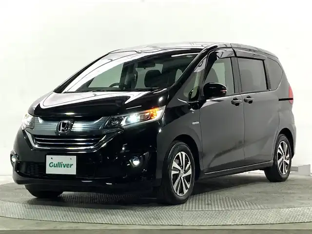 ホンダ フリード ハイブリット EX 大阪府 2016(平28)年 5.9万km クリスタルブラックパール 純正ナビ(フルセグ/DVD再生/Bluetooth) バックカメラ ETC 後席モニター 両側パワースライドドア ハーフレザー シートヒーター 衝突軽減 レーダークルコン ワンオーナー