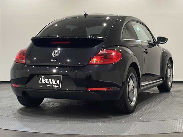 フォルクスワーゲン ザ・ビートル スペシャルバグ 新潟県 2015(平27)年 8万km ディープブラックパールエフェクト 専用ハーフレザーシート/純正17インチアルミホイール/専用エンブレム&デカール/リアスポイラー/純正オーディオ/ETC/クルーズコントロール/シートヒーター/後方カメラ付きミラー