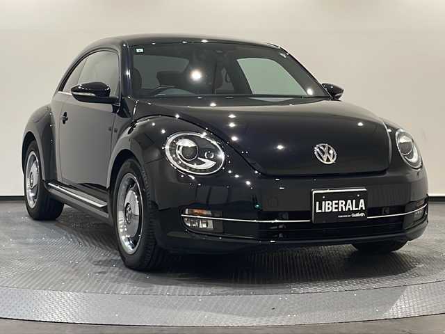 フォルクスワーゲン ザ・ビートル スペシャルバグ 新潟県 2015(平27)年 8万km ディープブラックパールエフェクト 専用ハーフレザーシート/純正17インチアルミホイール/専用エンブレム&デカール/リアスポイラー/純正オーディオ/ETC/クルーズコントロール/シートヒーター/後方カメラ付きミラー