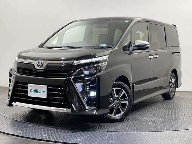 トヨタ ヴォクシー ZS 煌Ⅲ 愛媛県 2021(令3)年 3.5万km イナズマスパーキングブラックガラスフレーク ・１０型ナビ/（フルセグ/Bluetooth/CD/DVD/USB)/・バックカメラ/・衝突軽減ブレーキ/・前後ドライブレコーダー/・ＥＴＣ/・レーダークルーズコントロール/・１２．１型後席モニター/・両側パワースライドドア/・前後コーナーセンサー/・レーンキープアシスト/・オートマチックハイビーム/・LEDヘッドライト