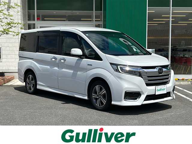 ホンダ ステップワゴン スパーダ ハイブリッド G EX ホンダセンシング 青森県 2018(平30)年 6万km プラチナホワイトパール ワンオーナー/社外10インチメモリナビ/フルセグTV/CD/DVD/BT/USB/バックカメラ/両側パワースライドドア/合皮コンビシート/前席シートヒーター/ホンダセンシング/衝突軽減ブレーキ/誤発進抑制機能/追従クルーズコントロール/レーンキープアシスト/サイドカーテンエアバック/ビルトインETC/シートバックテーブル/ドライブレコーダー/ビルトインETC/LEDヘッドライト/LEDフォグライト/純正16インチアルミホイール