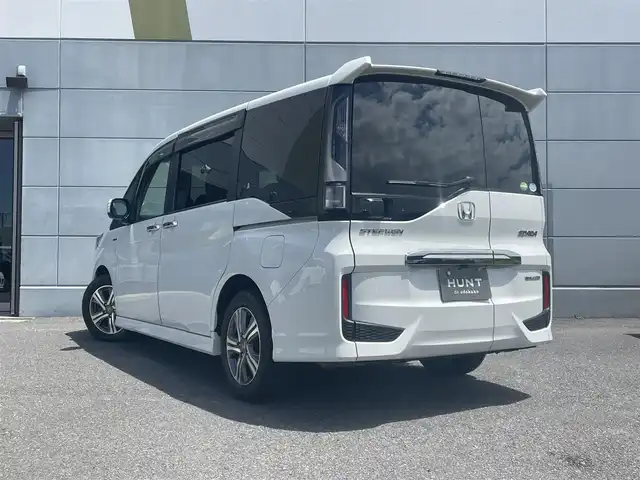 ホンダ ステップワゴン スパーダ ハイブリッド G EX ホンダセンシング 千葉県 2018(平30)年 6万km プラチナホワイトパール ワンオーナー/社外10インチメモリナビ/フルセグTV/CD/DVD/BT/USB/バックカメラ/両側パワースライドドア/合皮コンビシート/前席シートヒーター/ホンダセンシング/衝突軽減ブレーキ/誤発進抑制機能/追従クルーズコントロール/レーンキープアシスト/サイドカーテンエアバック/シートバックテーブル/ドライブレコーダー/ビルトインETC/LEDヘッドライト/LEDフォグライト/純正16インチアルミホイール