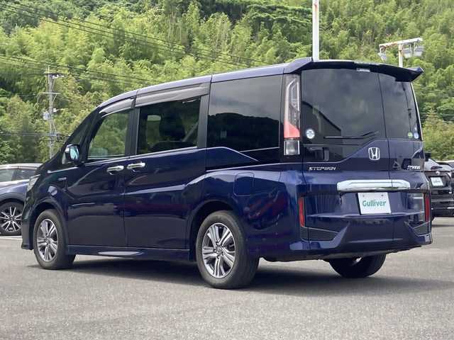 ホンダ ステップワゴン スパーダ ハイブリッド G EX ホンダセンシング 佐賀県 2018(平30)年 5.9万km オブシダンブルーパール Gathers9インチナビ/バックカメラ/衝突被害軽減システム/路線逸脱警報機能/オートハイビーム機能/クリアランスソナー/アダプティブクルーズコントロール/両側パワースライドドア/電動パーキングブレーキ/オートブレーキホールド/ハーフレザーシート/シートヒーター/ビルトインETC/ドライブレコーダー/ステアリングリモコン/プッシュスタート/スマートキー/LEDヘッドライト/フォグライト/純正アルミホイール