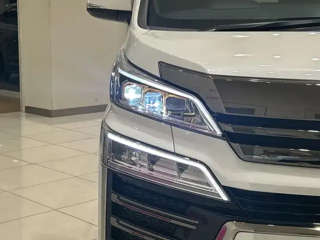 トヨタ ヴェルファイア ゴールデンアイズⅢ 埼玉県 2022(令4)年 5.4万km ホワイトパールクリスタルシャイン ツインムーンルーフ /純正フリップダウンモニター /純正9インチディスプレイオーディオ （TV・ナビ付）/バックカメラ /両側パワースライドドア /レーダークルーズコントロール /LED /ハーフレザーシート /純正18インチアルミホイール/ステアリングスイッチ /電子パーキング /ETC