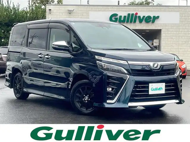 トヨタ ヴォクシー ZS 煌Ⅱ 島根県 2020(令2)年 4万km ブラッキッシュアゲハガラスフレーク 純正ＳＤナビ　/フルセグＴＶ　/ＤＶＤ再生　/Ｂｌｕｅｔｏｏｔｈ　/バックカメラ　/フリップダウンモニター　/ビルトインＥＴＣ　/クル－ズコントロール　/両側パワースライド　/レーンキープアシスト　/衝突軽減ブレーキ　/前後コーナーセンサー/オートハイビーム　/純正LEDライト/社外15インチアルミホイール