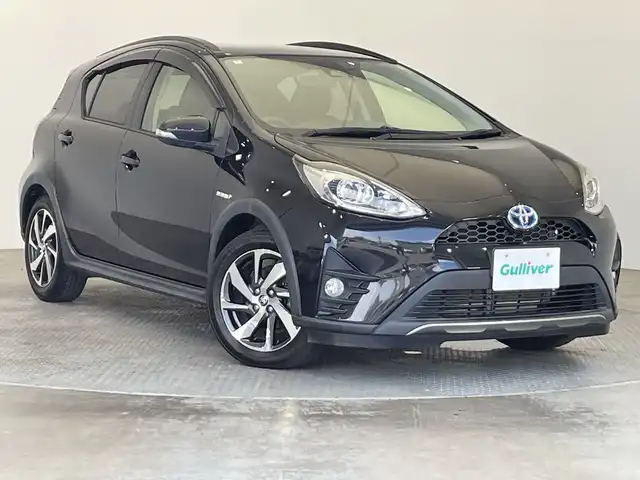 トヨタ アクア クロスオーバー 栃木県 2018(平30)年 6.2万km ブラックマイカ ALPINEナビ/（CD/DVD/フルセグTV/Bluetooth/MSV）/バックカメラ/トヨタセーフティセンス/・プリクラッシュセーフティ/・レーントレーシングアシスト/・レーンディパーチャーアラート/ETC/ハーフレザーシート/純正AW/純正フロアマット/LEDヘッドライト/フロントフォグ/ドアバイザー/ルーフレール