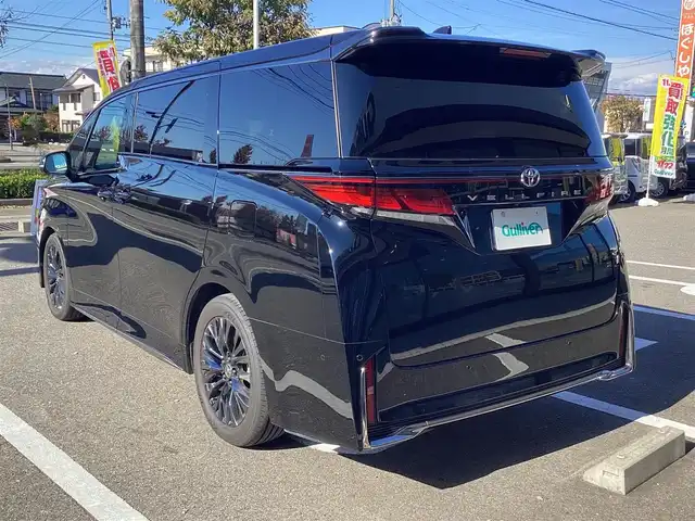 トヨタ ヴェルファイア Z プレミア 福島県 2025(令7)年 0.9万km ブラック  ワンオーナー / 4WD/ トヨタセーフティセンス/ プリクラッシュセーフティ/ レーンディパーチャーアラート/ オートクルーズコントロール/ プロアクティブドライビングアシスト/ フロントクロストラフィックアラート/ ブラインドスポットモニター/ 純正14型HDディスプレイオーディオ/ パノラミックビューモニター/ 13.2型有機EL後席モニター/ 両側パワースライドドア/ デジタルインナーミラー/ 3眼ヘッドライト/ スーパーロングオーバーヘッドコンソール/ 10スピーカー/ エグゼティブパワーシート（セカンドシート）/ パワーバックドア/ 置くだけ充電/ ナノイー/ 前後左右パワーシート/ シートヒーター&ベンチレーション/ カラーヘッドアップディスプレイ/ 電動パーキング（オートホールド）