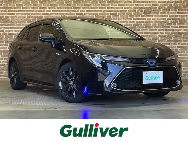 トヨタ カローラツーリング ハイブリッド ダブルバイビー 岩手県 2020(令2)年 9.3万km スパークリングブラックパールクリスタルシャイン ４WD/寒冷地仕様/シートヒーター/ステアリングヒーター/トヨタセーフティセンス/プリクラッシュセーフティ/純正９インチナビ（Bluetooth USB フルセグ AppleCarPlay AndroidAuto）/ブラインドスポットモニター/リヤクロストラフィックアラート/コーナーセンサー/レーンアシスト/クルーズコントロール/オートハイビーム/ヘッドライトレベライザー/ステアリングスイッチ/横滑り防止装置/バックカメラ/純正１７インチアルミホイール/AC100V1500W/置くだけ充電