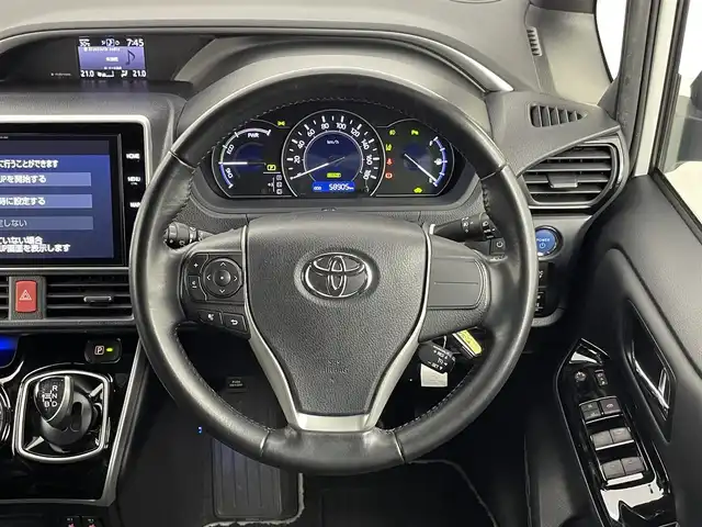 トヨタ ヴォクシー ハイブリッド ZS 煌Ⅲ 千葉県 2021(令3)年 5.9万km ホワイトパールクリスタルシャイン セーフティセンス/（衝突回避支援パッケージ）/・プリクラッシュセーフティシステム/・レーンディパーチャーアラート/・オートマチックハイビーム/・先行車発進告知機能/純正10インチメモリーナビ/・フルセグTV/・Bluetoothオーディオ接続/・CD/DVD再生機能/・バックカメラ/両側パワースライドドア/LEDヘッドライト/ビルトインETC2.0/前後コーナーセンサー/ハーフレザーシート/シートヒーター/スマートキー/クルーズコントロール