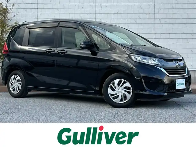 ホンダ フリード G ホンダセンシング 滋賀県 2016(平28)年 5.3万km クリスタルブラックパール 純正メーカーナビ【VXM-174VFi】/両側パワースライドドア/ビルトインETC/ドライブレコーダー/衝突軽減ブレーキ/横滑り防止装置/レーダクルーズコントロール/レーンキープアシスト/アイドリングストップ/バックカメラ/ステアリングスイッチ/ハンズフリー/ヘッドライトレベリング/電動格納ミラー/ECON/プッシュスタート/スマートキー/純正フロアマット/オートエアコン/LEDヘッドライト/ドアバイザー