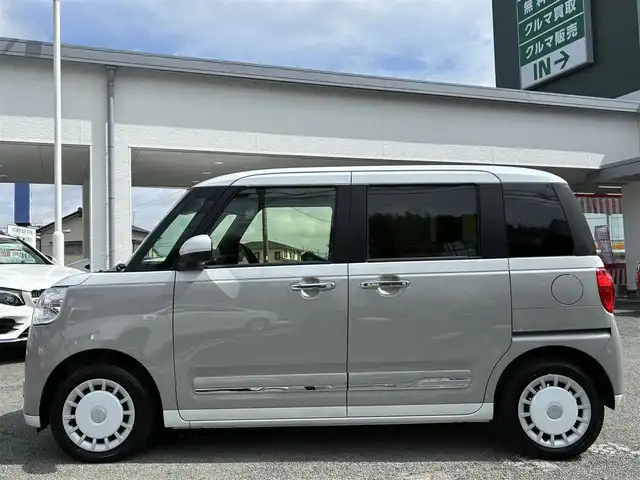 ダイハツ ムーヴ キャンバス ストライプス G 熊本県 2024(令6)年 0.5万km シャイニングホワイトパール/スムーズグレーマイカメタリック ワンオーナー/ディスプレイオーディオ/【CD/DVD/BT/AUX/USB】/全方位カメラ/衝突軽減ブレーキ/車線逸脱警報/パーキングセンサー/両側パワースライドドア/シートヒーター/ステアリングリモコン/アイドリングストップ/ＬＥＤオートライト/フォグランプ/電格式ミラー/社外フロアマット/電子パーキング/オートホールド/スマートキー/スペアキー/取扱説明書/保証書