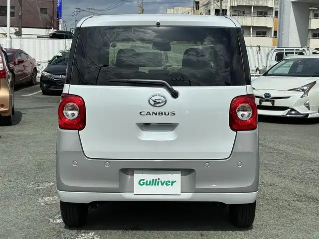 ダイハツ ムーヴ キャンバス ストライプス G 熊本県 2024(令6)年 0.5万km シャイニングホワイトパール/スムーズグレーマイカメタリック ワンオーナー/ディスプレイオーディオ/【CD/DVD/BT/AUX/USB】/全方位カメラ/衝突軽減ブレーキ/車線逸脱警報/パーキングセンサー/両側パワースライドドア/シートヒーター/ステアリングリモコン/アイドリングストップ/ＬＥＤオートライト/フォグランプ/電格式ミラー/社外フロアマット/電子パーキング/オートホールド/スマートキー/スペアキー/取扱説明書/保証書