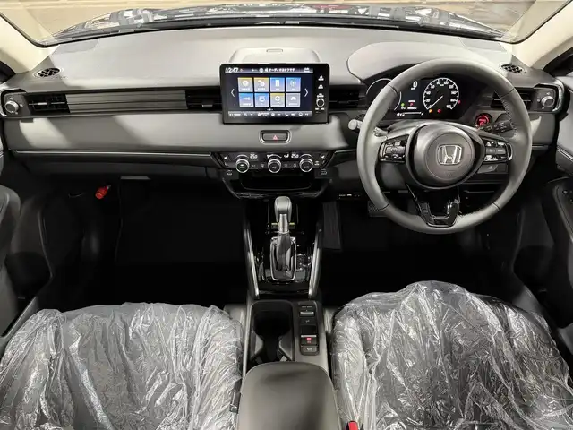 ホンダ ヴェゼル ハイブリッド e:HEV Z 大阪府 2025(令7)年 0.1千km クリスタルブラックパール 登録済未使用車 純正9incナビTV バックカメラ ハーフレザー シート＆ハンドルヒーター 電動リアゲート レーダークルコン 衝突軽減ブレーキ レーンアシスト ブラインドSM ダウンヒルアシスト 置き型充電
