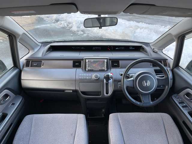 ホンダ ステップワゴン G 道央・札幌 2007(平19)年 14.3万km ナイトホークブラックパール ４WD/純正ディーラーOPナビ/CD/DVD/フルセグ/バックカメラ/ECONモード/片側パワースライドドア/リモコンキー/LEDヘッドライト/ヘッドライトレベライザー/電動格納ミラー/純正フロアマット/ドアバイザー/スペアキー/純正エンジンスターター