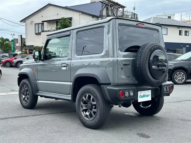 スズキ ジムニー シエラ JC 静岡県 2024(令6)年 0.3万km ミディアムグレー エンジンスタートボタン/ワンオーナー/パワーステアリング/パワーウィンドウ/4WD/アイドリングストップ/スマートキー/オートエアコン/クルーズコントロール/CD/CDチェンジャー/純正フロアマット/純正アルミホイール/D席N席シートヒーター/背面タイヤ/ABS/横滑り防止装置/コーナーセンサー後/センターデフロック/レーンキープアシスト/オートライト/LEDライト/オートマチックハイビーム/ダウンヒルアシストコントロール/W+サイドエアバック/衝突軽減システム