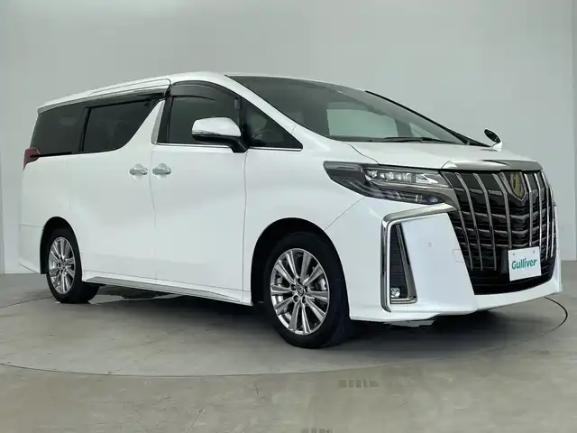 トヨタ アルファード S タイプゴールドⅡ 鹿児島県 2022(令4)年 1.5万km ホワイトパールクリスタルシャイン 純正ナビ付ディスプレイディオ/・Bluetooth/・TV/・AM/・FM/純正フリップダウンモニター/トヨタセーフティ/純正前後ドラレコ/両側パワースライドドア/アダプティブクルーズコントロール/18インチ純正アルミホイール/純正フロアマット/ビルドインETC/AC100V/MTモード付AT/テレビキャンセラー