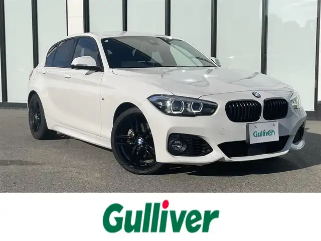 ＢＭＷ １１８ｉ Mスポーツ エディションシャドー 大阪府 2018(平30)年 6.6万km アルピンホワイトⅢ EditionShadow（限定モデル）/・ダークカラーLEDヘッドライト/・リヤコンビネーションライト/・ハイグロスブラックキドニーグリル/・18インチMライトアロイホイールダブルスポークジェットブラック/BMWコネクテッドドライブ/純正ナビ /　（CD/DVD/Bluetooth/USB）/純正ドライブレコーダー（前後）/レザーシート（合皮）/　（前席パワーシート/前席シートヒーター） /バックカメラ /純正ミラー内蔵型ETC