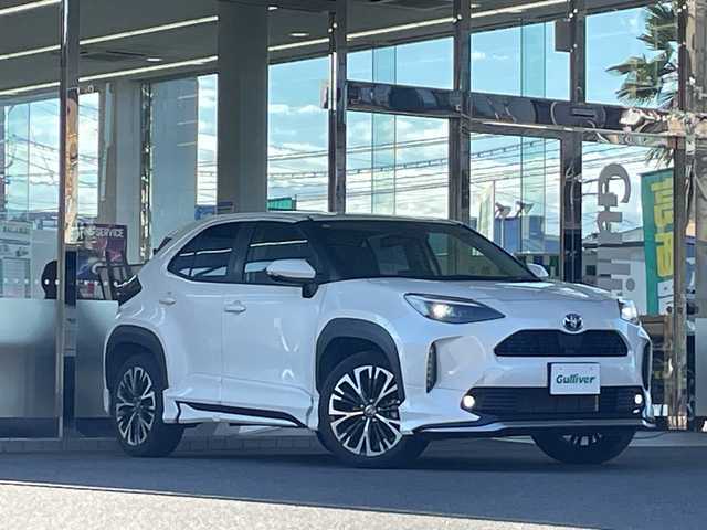トヨタ ヤリスクロス ハイブリッド Z 福島県 2021(令3)年 3.4万km ホワイトパールクリスタルシャイン ワンオーナー　純正ディスプレイオーディオ　バックカメラ　全周囲カメラ　モデリスタエアロ　レーダークルーズコントロール　パワーシート　シートヒーター　前方ドライブレコーダー　ハーフレザーシート　純正ＡＷ ビルトインETC プッシュスタート オートライト オートマッチクハイビーム ステアリングスイッチ RSA PKSB PCS LTA　スマートキー スペアキー×1 保証書 取扱説明書