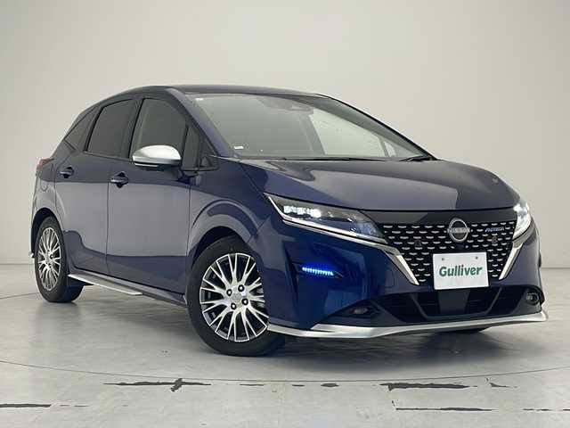日産 ノート オーテック 沖縄県 2021(令3)年 5.5万km オーロラフレアブルーパール 純正オプションナビ/(フルセグTV、Bluetooth、CD、DVD、USB)/アラウンドビューモニター/デジタルインナーミラー/ＥＴＣ２．０/純正ドライブレコーダー(DH5-S)/エマージェンシーブレーキ/プロパイロット/ＬＥＤヘッドライト/オートライト/ハーフレザーシート/シートヒーター/純正16インチアルミホイール/純正フロアマット/クリアランスソナー