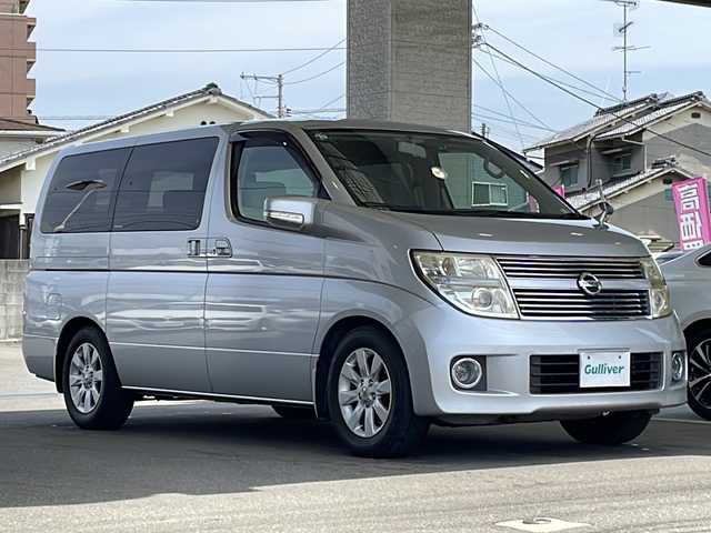 日産 エルグランド 350X 愛媛県 2007(平19)年 2.7万km ブリリアントシルバー メーカーHDDナビ/（CD/DVD/HDD/AUX）/バックカメラ/純正フリップダウンモニター/前方ドライブレコーダー/スマートキー/ETC/両側パワースライドドア/運転席パワーシート/社外レーダー/電動室内カーテン/後席オットマン/5.1チャンネルサラウンド/レザーステアリング/ステアリングスイッチ/MTモード/コーナーポール