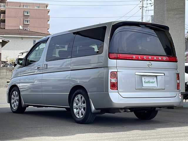 日産 エルグランド 350X 愛媛県 2007(平19)年 2.7万km ブリリアントシルバー メーカーHDDナビ/（CD/DVD/HDD/AUX）/バックカメラ/純正フリップダウンモニター/前方ドライブレコーダー/スマートキー/ETC/両側パワースライドドア/運転席パワーシート/社外レーダー/電動室内カーテン/後席オットマン/5.1チャンネルサラウンド/レザーステアリング/ステアリングスイッチ/MTモード/コーナーポール