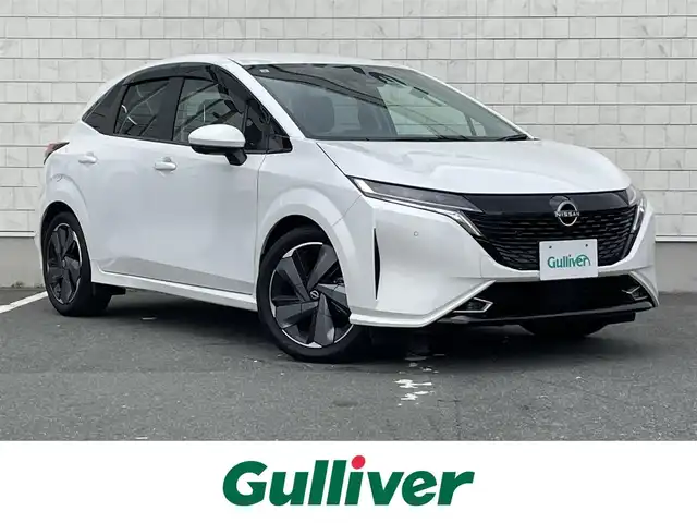 日産 オーラ G レザーエディション 愛知県 2023(令5)年 1.3万km ピュアホワイトパール ・ワンオーナー/・BOSEスピーカー/・純正HDDナビ/・全方位カメラ/・フルセグTV/・ETC2.0/・Bluetooth/USB/TypeC/HDMI接続/・アダプティブクルーズコントロール/・シートヒーター（D/N）/・本革シート/・純正フロアマット/・純正17インチアルミホイール/・LEDヘッドライト/・コーナーセンサー/・VDC/・衝突軽減ブレーキ/・ブラインドスポットモニター/・ブレーキホールド/・充電用USBポート（1個）/・ワイヤレス充電器/・ステアリングヒーター/・デジタルインナーミラー/・プロパイロット/・スマートキー/・プッシュスタート