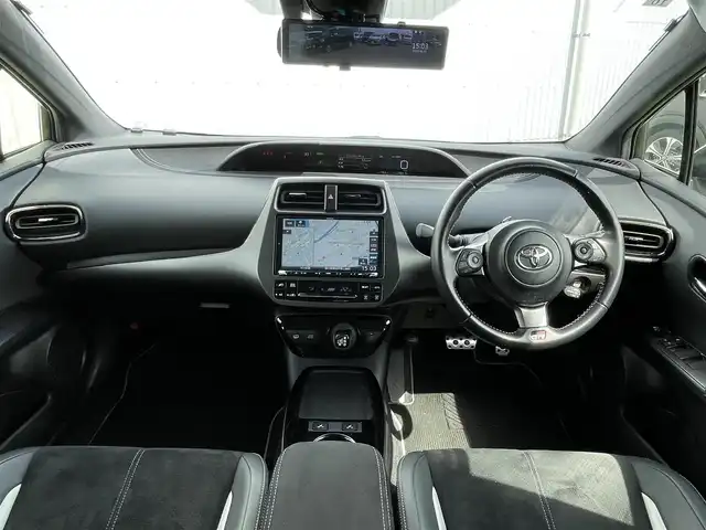 トヨタ プリウス ＰＨＶ S GRスポーツ 香川県 2021(令3)年 3.1万km プラチナホワイトパールマイカ 登録時走行距離：30713km/ケンウッド9型ナビゲーション/→CD/DVD/BT/→フルセグTV/バックカメラ/ドライブレコーダー/ETC/AC100V/ビルシュタイン車高調/プリクラッシュセーフティ/レーンキープアシスト/レーダークルーズコントロール/オートハイビーム/LEDオートヘッドライト/フォグランプ/リアフォグランプ/ステアリングリモコン/革巻きステアリング/横滑り防止装置/シートヒーター/ハーフレザーシート/プッシュスタート/スマートキー
