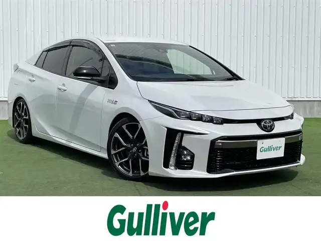 トヨタ プリウス ＰＨＶ S GRスポーツ 香川県 2021(令3)年 3.1万km プラチナホワイトパールマイカ 登録時走行距離：30713km/ケンウッド9型ナビゲーション/→CD/DVD/BT/→フルセグTV/バックカメラ/ドライブレコーダー/ETC/AC100V/ビルシュタイン車高調/プリクラッシュセーフティ/レーンキープアシスト/レーダークルーズコントロール/オートハイビーム/LEDオートヘッドライト/フォグランプ/リアフォグランプ/ステアリングリモコン/革巻きステアリング/横滑り防止装置/シートヒーター/ハーフレザーシート/プッシュスタート/スマートキー