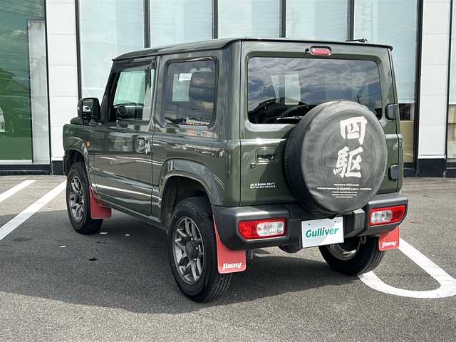 スズキ ジムニー XC 岐阜県 2019(平31)年 8.6万km ジャングルグリーン 登録時走行距離：86002km/純正SDナビ（KXM-E503W）/フルセグテレビ・Bluetooth・CD・DVD・USB/バックカメラ/前席シートヒーター/４WD/ターボ車/背面タイヤ/ETC/デュアルセンサーブレーキサポート/クルーズコントロール/レーンキープアシスト/LEDヘッドライト/オートライト/ダウンヒルアシストコントロール/プッシュスタート/スマートキー/純正16インチアルミホイール/純正フロアマット