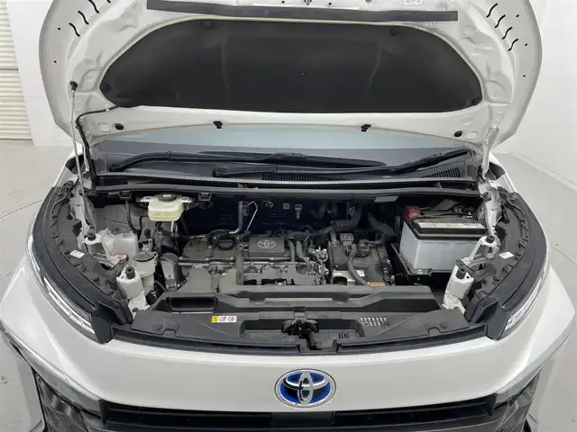 トヨタ ヴォクシー ハイブリッド S－G 茨城県 2022(令4)年 4.9万km ホワイトパールクリスタルシャイン 純正10.5型DAナビ/フルセグ/CD/DVDデッキ/HDMI/アドバンストパーク/全方位カメラ/14型フリップダウンモニター/衝突被害軽減ブレーキ/車線逸脱抑制装置/レーダークルーズコントロール/オートマチックハイビーム/クリアランスソナー/BSM/片側電動スライドドア/ETC2.0/ドラレコ/純正16インチAW/LEDヘッドライト/スマートキー