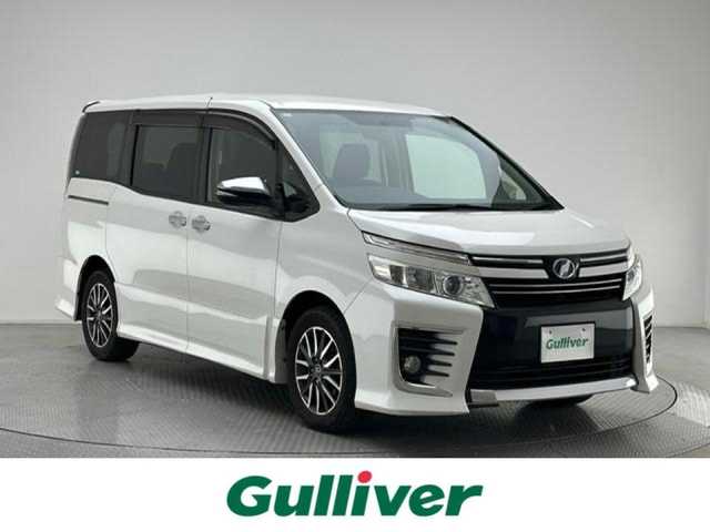 トヨタ ヴォクシー ZS 煌 兵庫県 2015(平27)年 8.8万km ホワイトパールクリスタルシャイン 社外9インチナビ/フルセグ CD DVD BT MSV/バックカメラ/両側パワースライドドア/ALPINEフリップダウンモニター/社外ドライブレコーダー/ETC/LEDヘッドライト/フォグライト/オートライト/純正16インチアルミホイール/アイドリングストップ/スマートキー