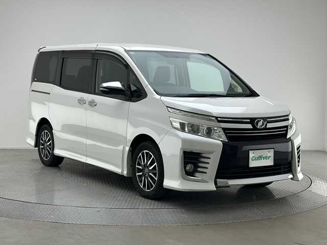 トヨタ ヴォクシー ZS 煌 兵庫県 2015(平27)年 8.8万km ホワイトパールクリスタルシャイン 社外9インチナビ/フルセグ CD DVD BT MSV/バックカメラ/両側パワースライドドア/ALPINEフリップダウンモニター/社外ドライブレコーダー/ETC/LEDヘッドライト/フォグライト/オートライト/純正16インチアルミホイール/アイドリングストップ/スマートキー