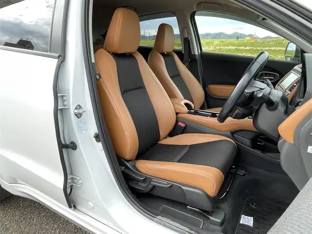 ホンダ ヴェゼル ハイブリッド Z ホンダセンシング 新潟県 2018(平30)年 6.1万km プラチナホワイトパール 4WD/純正インターナビ(VXM-184VFi)/CD/DVD/BT/フルセグテレビ/バックカメラ/ETC/ドライブレコーダー/衝突被害軽減ブレーキ/レーンキープアシスト/レーダークルーズコントロール/半革シート/シートヒーター /パドルシフト/ステアリングスイッチ/スマートキー/プッシュスタート/LEDヘッドライト/オートライト/フォグランプ/純正17インチアルミホイール